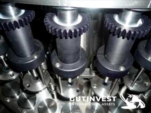 Glass bottle filling machine. Capacity 10,000 bottles/hour
