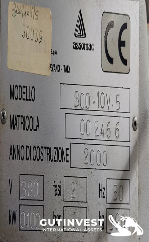 Máquina automática para clavar tacones