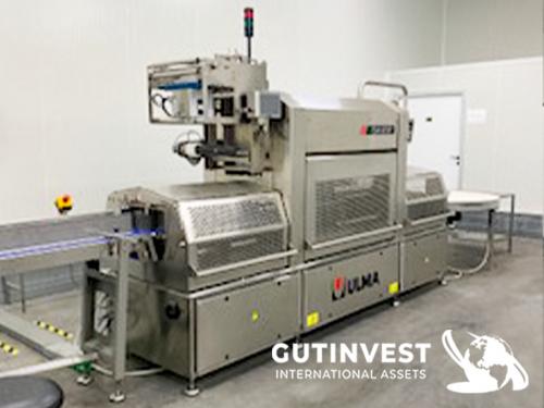 Automatic traysealing machine