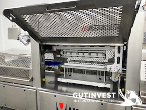 Automatic traysealing machine