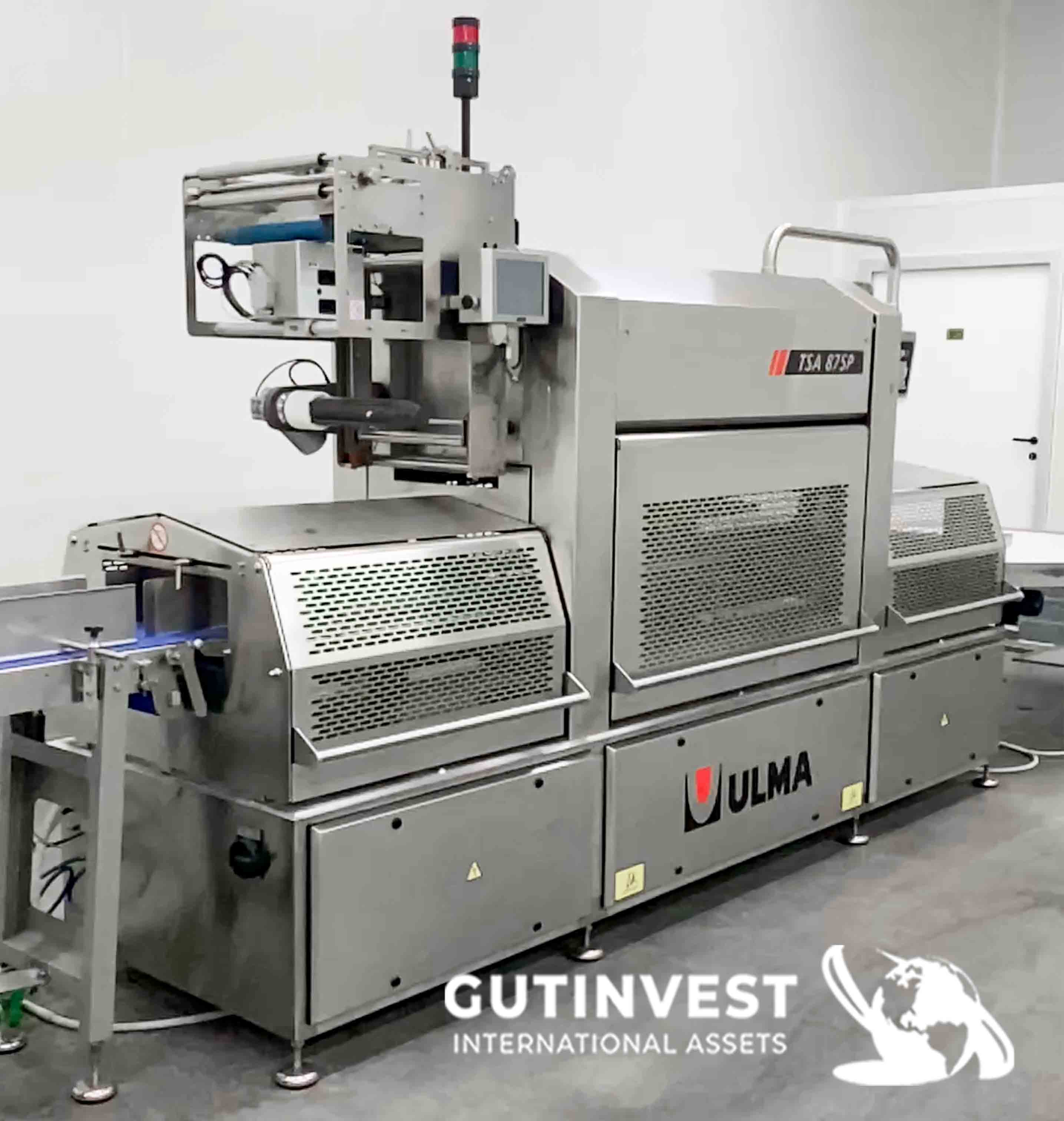 Automatic traysealing machine